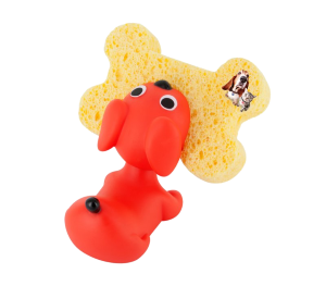 a puppy holding a sponge